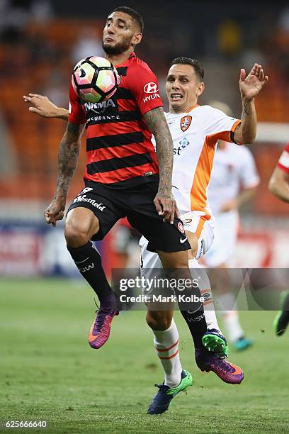 Kerem Bulut of the Wanderers is fouled by Jade North of the Roar during the round eight A-League match between the Western Sydney Wanderers and the...