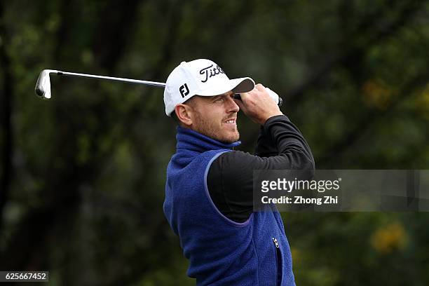 Michael Skelton of Great Britain plays a shot during the second round of the Buick open at Guangzhou Foison Golf Club on November 25, 2016 in...