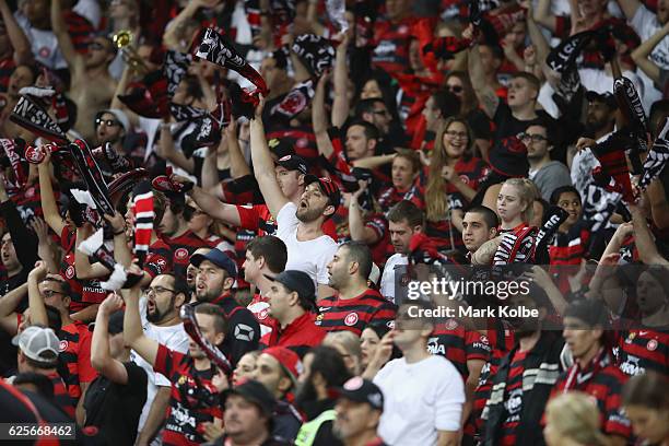 Wanderers supporters in the Red and Black Block cheer during the round eight A-League match between the Western Sydney Wanderers and the Brisbane...