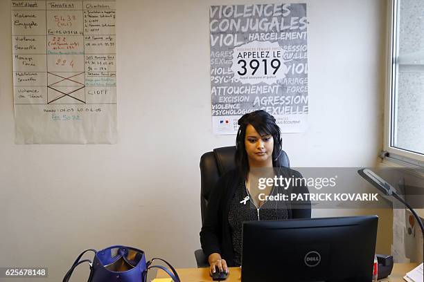 An employee of the French Fédération Nationale Solidarité Femmes receives calls of the French national domestic and sexual violence against women...