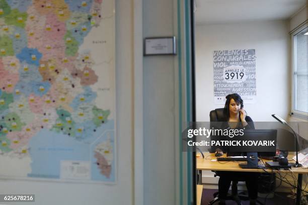 An employee of the French Fédération Nationale Solidarité Femmes receives calls of the French national domestic and sexual violence against women...