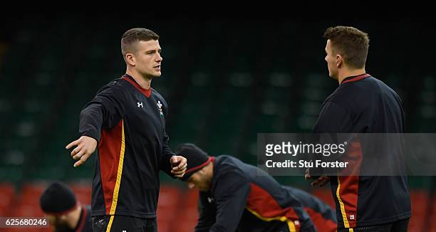 Wales centres Scott Williams and Jonathan Davies chat during Wales captain's run ahead of their final autumn series match against South Africa at...