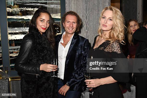 Model Cynthia Lancien, NIcolas Mereau and model Senta Schnabl attend 'Vibrations' Stefanie Renoma Photo Exhibition at Hotel Nolinski on November 24,...