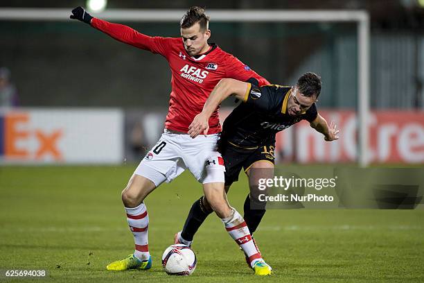 Mats Seuntjens of AZ and Robbie Benson of Dundalk fight for the ball during the UEFA Europa League Group D match between Dundalk FC and AZ Alkmaar at...