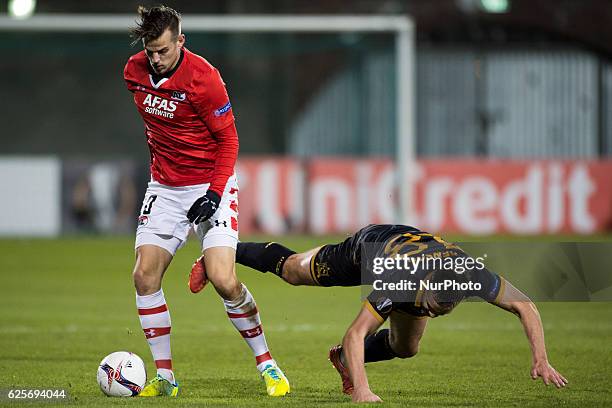 Mats Seuntjens of AZ fights for the ball with Robbie Benson of Dundalk during the UEFA Europa League Group D match between Dundalk FC and AZ Alkmaar...