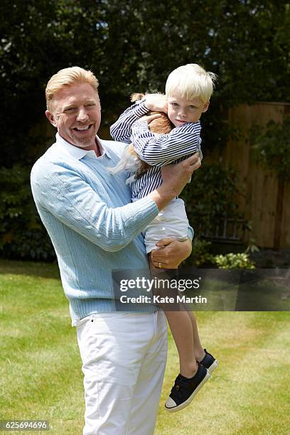 Tv commentator and former champion player Boris Becker with his son Amadeus are photographed at home for Hello magazine on June 15, 2015 in London,...