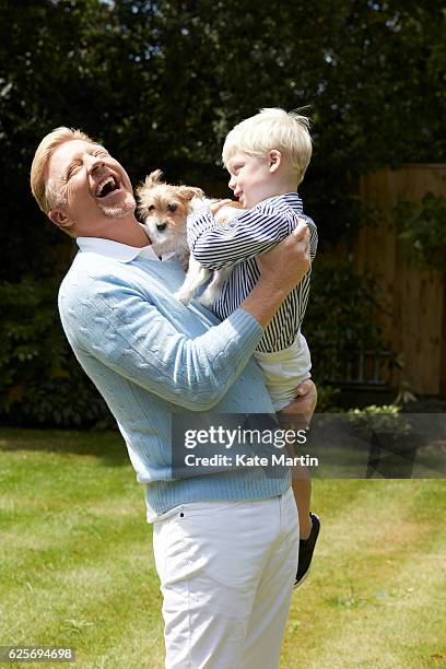 Tv commentator and former champion player Boris Becker with his son Amadeus are photographed at home for Hello magazine on June 15, 2015 in London,...