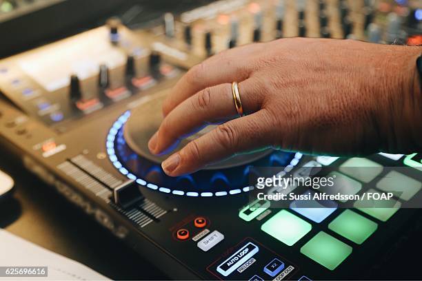 close-up of a person's hand playing music - record scratching stock pictures, royalty-free photos & images