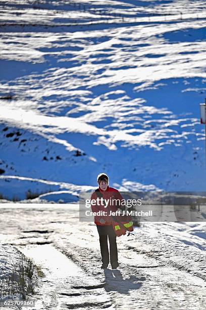 Postwoman Fiona Scott delivers mail in Scotlands highest village on November 25, 2016 in Wanlockhead,Scotland. Widespread hard frost and patchy fog...