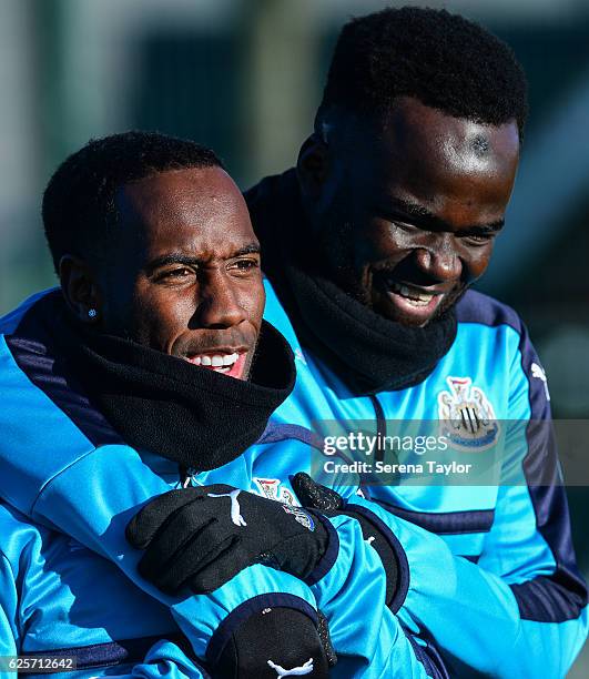 Vurnon Anita and Cheick Tiote have a laugh during Newcastle United Training Session at The Newcastle United Training Centre on November 25, 2016 in...