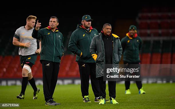 Springbok coach Allister Coetzee looks on with his coaches during South Africa training ahead of their match against Wales at Principality Stadium on...