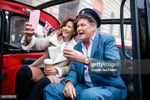 David Hasselhoff and a British Airways pilot drive around the streets of Munich in a uBA London taxi during a competition to launch the British...