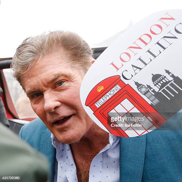 David Hasselhoff and a British Airways pilot drive around the streets of Munich in a uBA London taxi during a competition to launch the British...