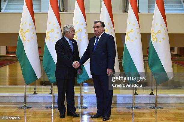 Kazakhstan's Foreign Minister Erlan Idrissov meets Tajikistan's President Emomali Rahmon during his official visit in Dushanbe, Tajikistan on...