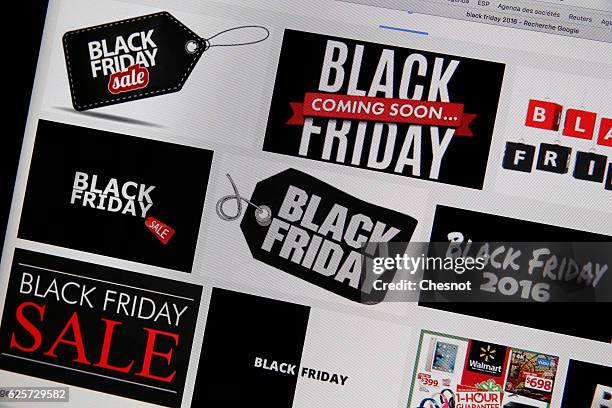 In this photo illustration, "Black Friday" signs are displayed on a laptop screen on November 25, 2016 Paris, France. Imported from the United...