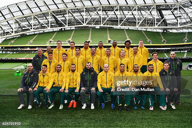 Players and coaching staff pose prior to the Australia Captain's Run on the eve of their international match against Ireland at Aviva Stadium on...