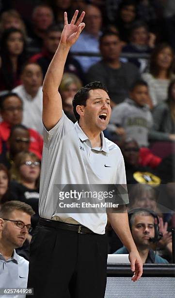 Head coach Bryce Drew of the Vanderbilt Commodores signals his players as they take on the Butler Bulldogs during the 2016 Continental Tire Las Vegas...
