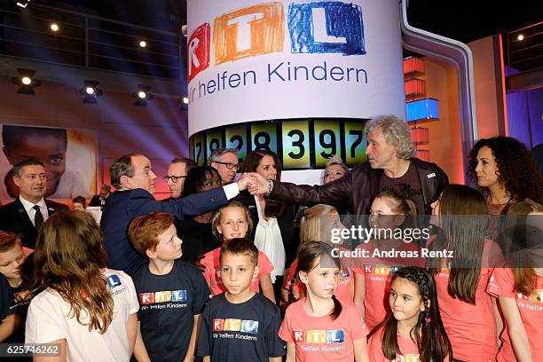 Wolfram Kons thanks Thomas Gottschalk during the RTL Telethon TV show on November 25, 2016 in Cologne, Germany. The telethon is held every year and...