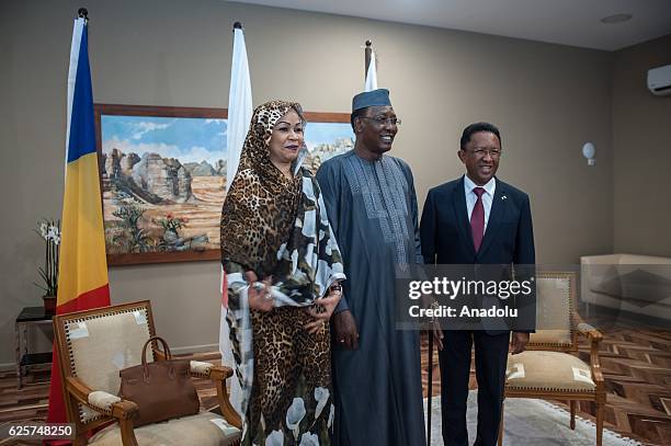 President of Chad Idriss Deby and his wife Hinda Deby meet the President of Madagascar Hery Rajaonarimampianina at Ivato International Airport before...