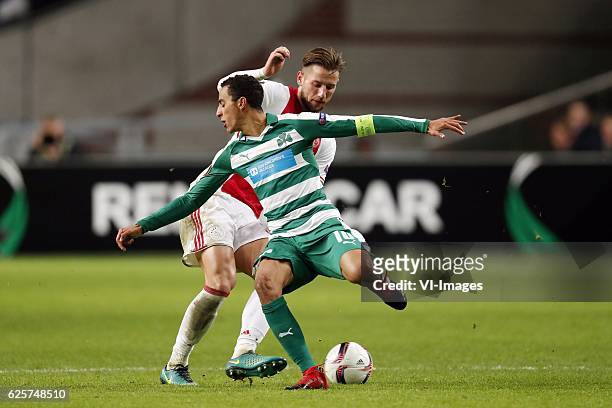 Mitchell Dijks of Ajax, Zeca of Panathinaikos F.C.during the UEFA Europa League group G match between Ajax Amsterdam and Panathinaikos FC at the...
