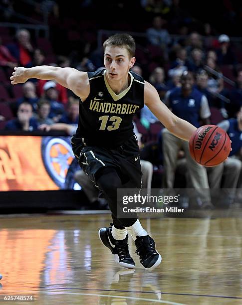 Riley LaChance of the Vanderbilt Commodores drives against the Butler Bulldogs during the 2016 Continental Tire Las Vegas Invitational basketball...