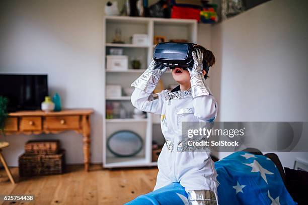 exploring space from home - space suit stock pictures, royalty-free photos & images