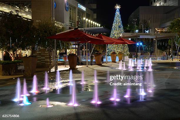 fountains at cityscape in downtown phoenix - ice rink phoenix stock pictures, royalty-free photos & images