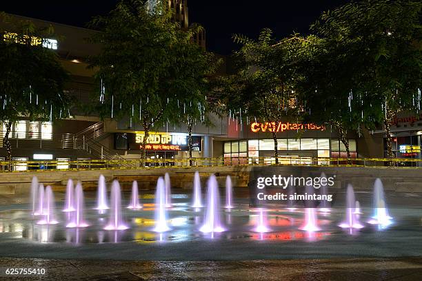 illuminated fountains at cityscape in downtown phoenix - arizona christmas stock pictures, royalty-free photos & images