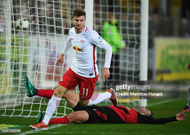 Timo Werner of RB Leipzig celebrates after scoring the second goal for RB Leipzig during the Bundesliga match between SC Freiburg and RB Leipzig at...