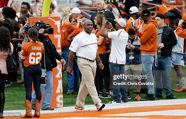 Head coach Charlie Strong of the Texas Longhorns walks on the field before the game against the TCU Horned Frogs at Darrell K Royal -Texas Memorial...