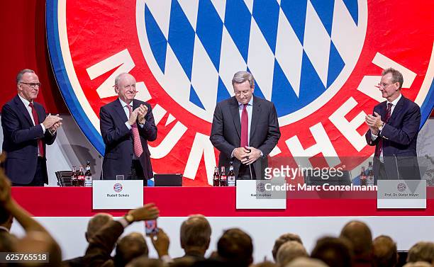President of FC Bayern Muenchen Karl Hopfner reacts beside Chairman of the board Karl-Heinz Rummenigge , First Vice President Rudolf Schels and Vice...