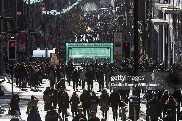 a busy city street - glasgow people stock pictures, royalty-free photos & images