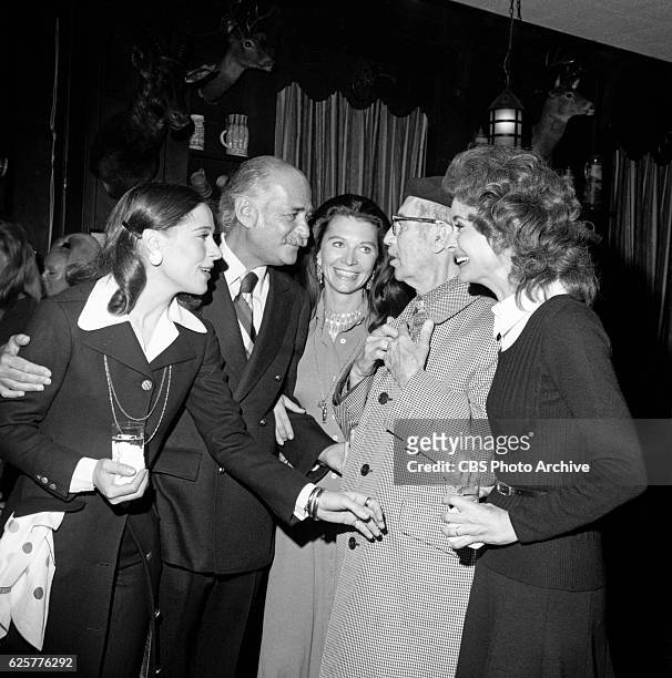 Television producer Norman Lear is pictured with guests including Groucho Marx and his wide Frances Lear at a cocktail party held for Norman Lear, at...