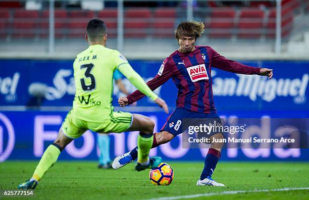 Takashi Inui of SD Eibar duels for the ball with Alex Martinez of Real Betis during the La Liga match between SD Eibar and Real Betis Balompie at...