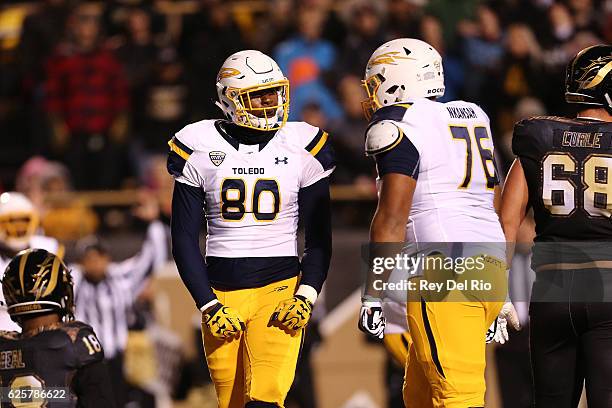 Michael Roberts of the Toledo Rockets celebrates his touchdown in the first quarter against the Western Michigan Broncos at Waldo Stadium on November...