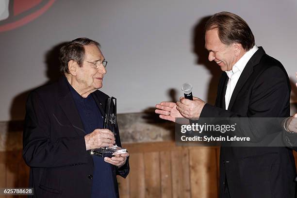 Robert Hossein and Aleksei Guskov meet fans before the tribute to Robert Hossein during Russian Film Festival on November 25, 2016 in Honfleur,...