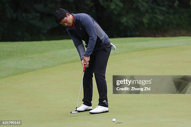 Xinjun Zhang of China plays a shot during the second round of the Buick open at Guangzhou Foison Golf Club on November 25, 2016 in Guangzhou, China.