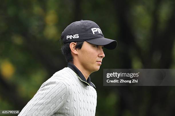 Xinyang Li of China plays a shot during the second round of the Buick open at Guangzhou Foison Golf Club on November 25, 2016 in Guangzhou, China.