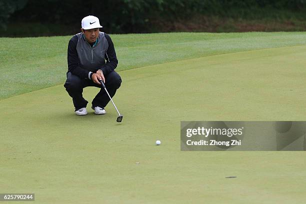 Alexander Kang of the United States plays a shot during the second round of the Buick open at Guangzhou Foison Golf Club on November 25, 2016 in...