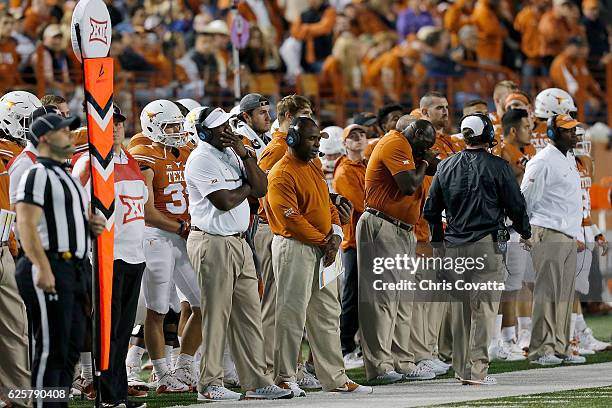 Head coach Charlie Strong of the Texas Longhorns stands on the sidelines as his team is defeated 31-9 by the TCU Horned Frogs at Darrell K Royal...