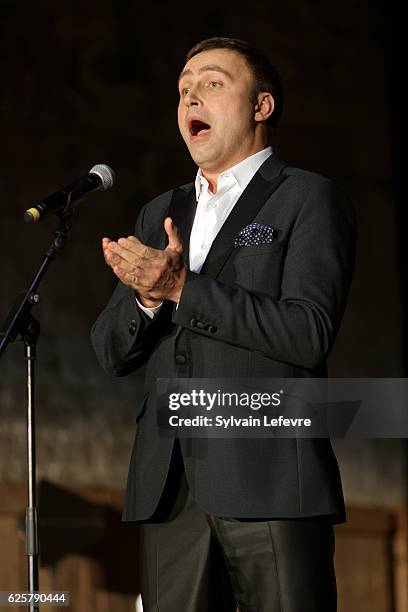 Russian baritone Vladislav Kosarev performs on stage during Russian Film Festival on November 25, 2016 in Honfleur, France.