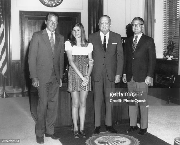 American actor Efrem Zimbalist Jr and his daughter , Stephanie Zimbalist, pose with FBI Director J Edgar Hoover and an unidentified man during a...