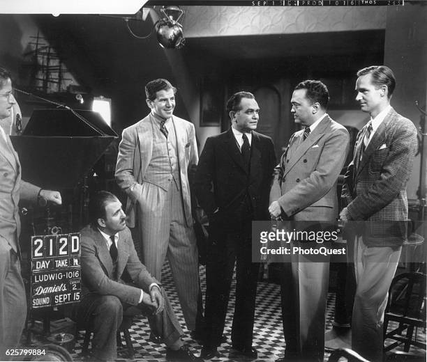 American actor Edward G Robinson talks with FBI Director J Edgar Hoover on the set of 'The Last Ganster,' Hollywood, California, September 15, 1937....
