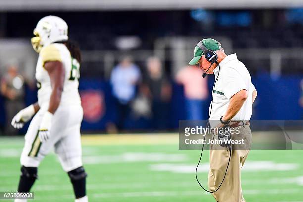 Head coach Jim Grobe of the Baylor Bears at a time out during the first half of the game against the Texas Tech Red Raiders on November 25, 2016 at...