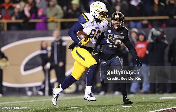 Michael Roberts of the Toledo Rockets makes a catch for a touchdown against the Western Michigan Broncos in the fourth quarter at Waldo Stadium on...