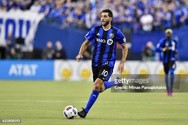 Ignacio Piatti of the Montreal Impact runs with the ball during leg one of the MLS Eastern Conference finals against the Toronto FC at Olympic...