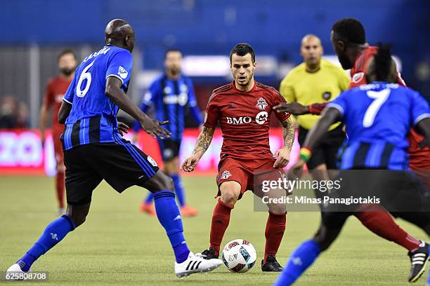 Sebastian Giovinco of the Toronto FC tries to play the ball during leg one of the MLS Eastern Conference finals against the Montreal Impact at...