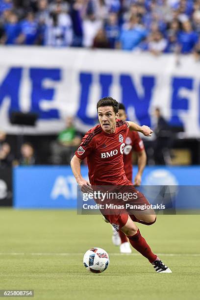 Will Johnson of the Toronto FC runs with the ball during leg one of the MLS Eastern Conference finals against the Montreal Impact at Olympic Stadium...