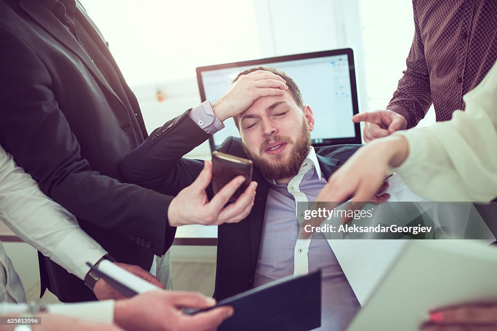 Stressful Businessman with Headache when Receiving Many Complaint and Issue
