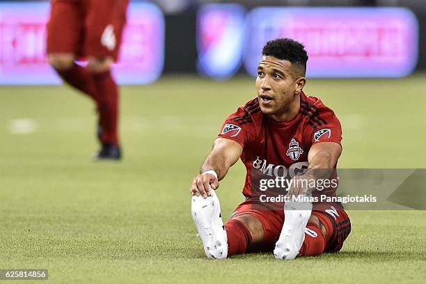 Justin Morrow of the Toronto FC looks on as he sits on the pitch during leg one of the MLS Eastern Conference finals against the Montreal Impact at...